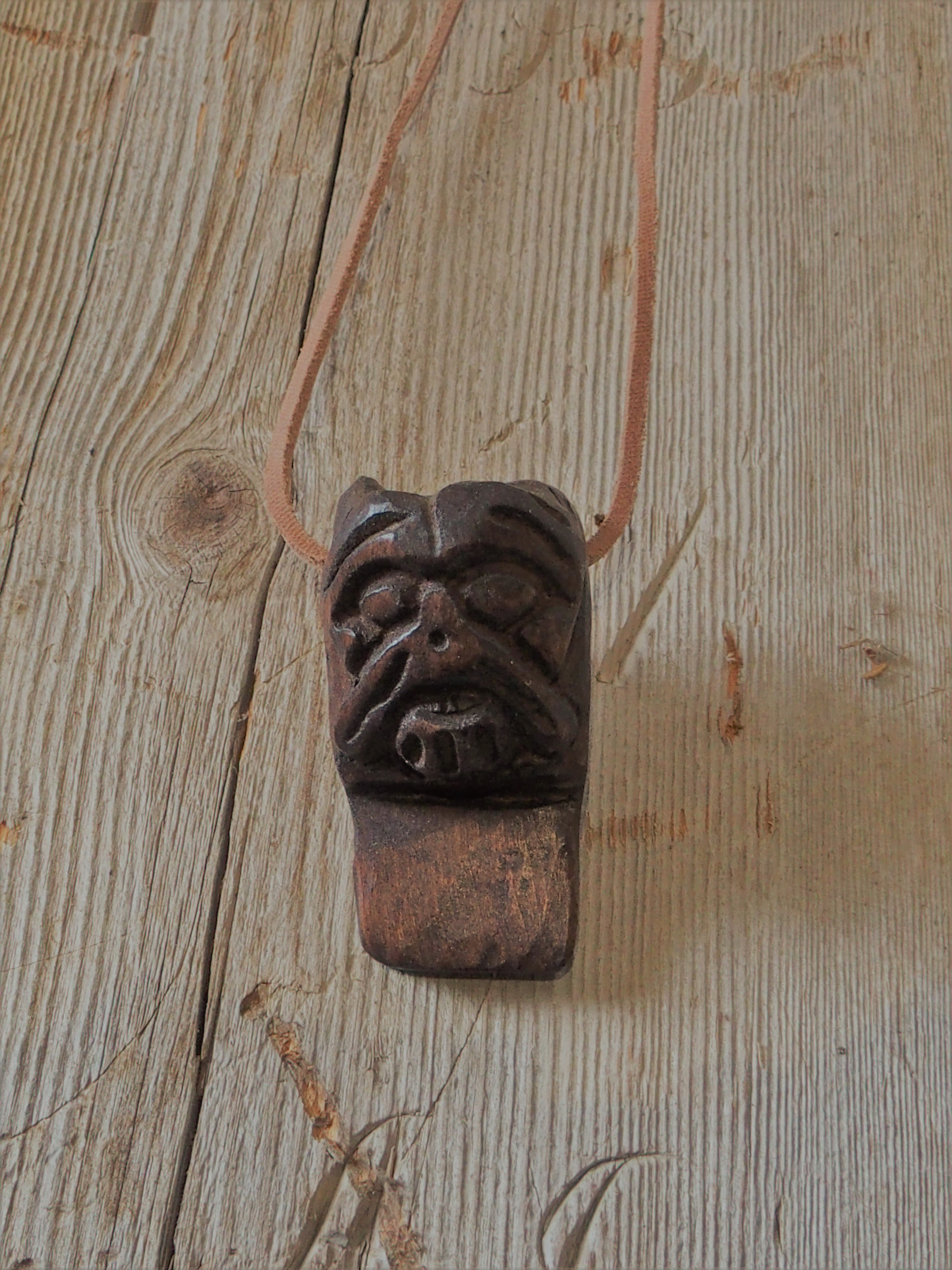 Maske frå Oseberg-slede